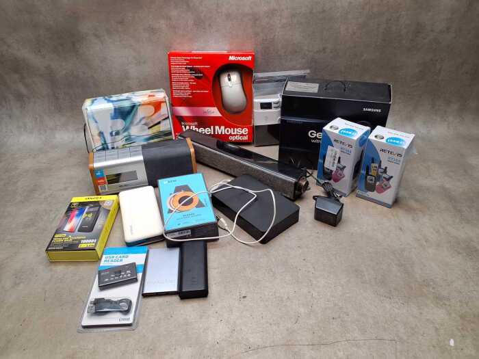 Collection of tech items, including Samsung VR