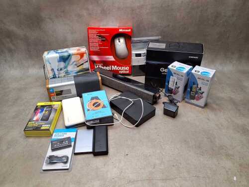 Collection of tech items, including Samsung VR