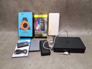 Collection of tech items, including Samsung VR - 3