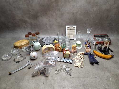 Assorted collectible items including a Sesame Street bedside clock