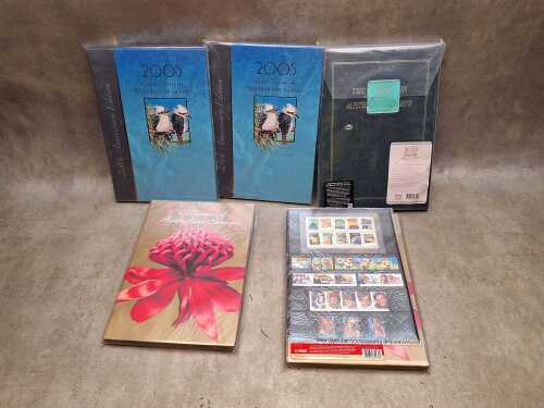Five Australia Post stamp Year books