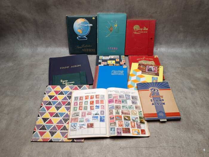 11 Stock books of World stamps including Poland