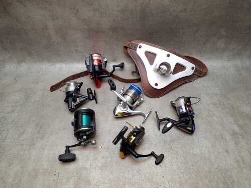 Six fishing reels, including Challenger