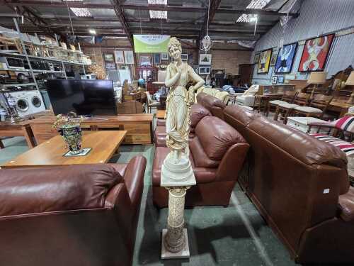 Classical figurative sculpture on pedestal
