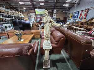 Classical figurative sculpture on pedestal