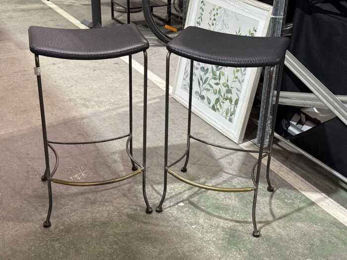 Pair of metal bar stools with woven seats