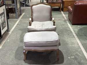 Cream upholstered occasional chair and ottoman