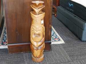 A hand carved timber figure