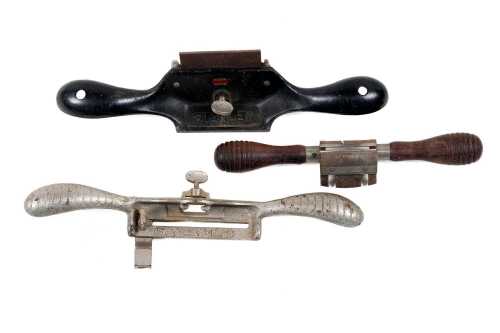 Two Stanley spokeshaves including Nos. 66 and 67, and Stanley cabinet scraper no.80