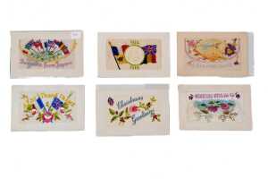 Six World War I silk embroidered postcards, mostly French