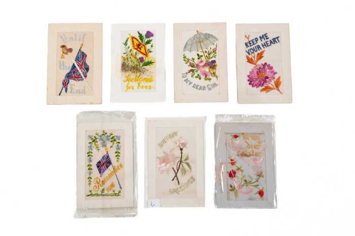Six World War I silk embroidered postcards, mostly French