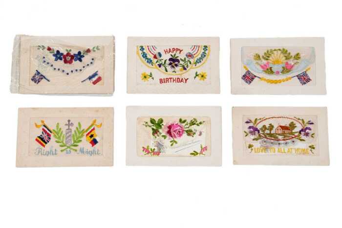 Six World War I silk embroidered postcards, mostly French