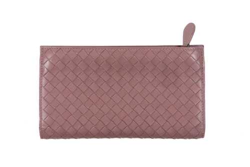 A Bottega Veneta Intrecciato long wallet in dusty pink