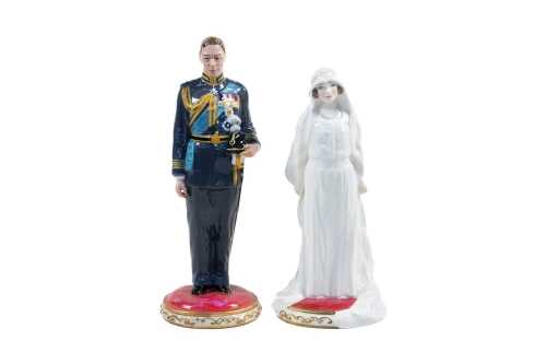 Pair of Royal Doulton porcelain figures of Prince Albert Duke of York and Elizabeth Bowes-Lyon