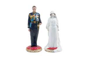Pair of Royal Doulton porcelain figures of Prince Albert Duke of York and Elizabeth Bowes-Lyon