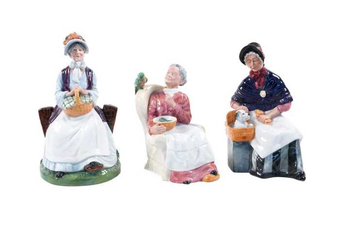 Three Royal Doulton grandmother porcelain figures including New Companions, Pretty Polly and Rest Awhile