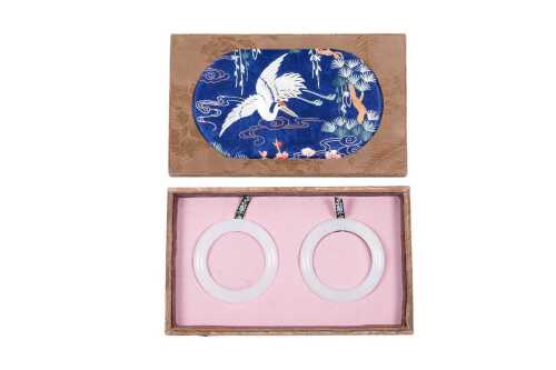 A pair of white jade bangles