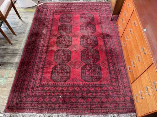 Traditional Afghan hand-knotted wool rug with 'Elephant Foot' design