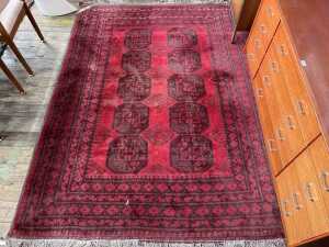 Traditional Afghan hand-knotted wool rug with 'Elephant Foot' design