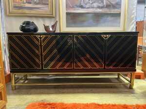 Hollywood Regency-style black lacquer and brass sideboard