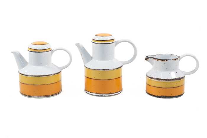 Three pieces of Midwinter Stonehenge 'Sun' pottery including teapot, hot water pot and jug