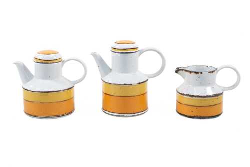 Three pieces of Midwinter Stonehenge 'Sun' pottery including teapot, hot water pot and jug
