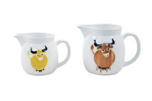 Two Arabia 'Heluna' porcelain graduated jugs