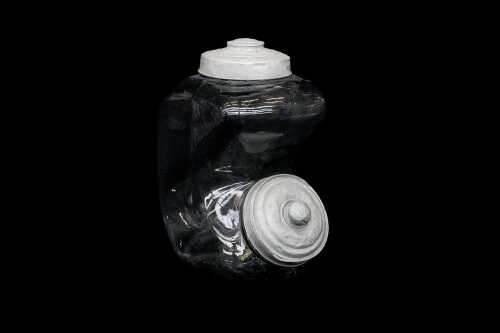 Vintage cafe glass jar with angled design and metal lids