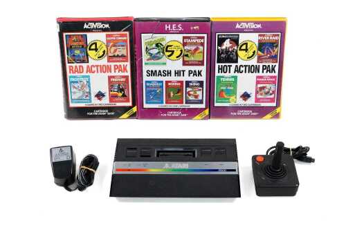 Vintage Atari 2600 games console with 42 games cartridges