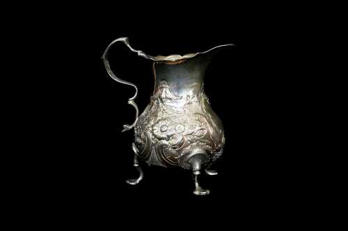 George II English sterling silver tri-footed creamer, 1759