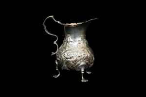 George II English sterling silver tri-footed creamer, 1759