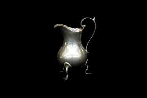 Late Victorian English sterling silver tri-footed creamer, weight 65g