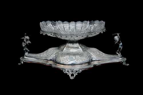 Antique silver plated centrepiece with glass insert and cherubs