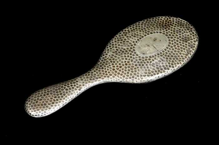 Arts and Crafts English sterling silver mounted hand mirror