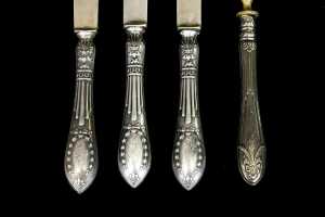 Three Latvian 875 silver dessert knives, plus an 875 silver mounted fork - 3