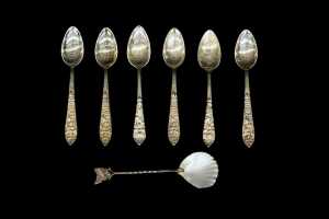 Six Thai silver spoons, plus a Tasmanian shell mounted souvenir spoons