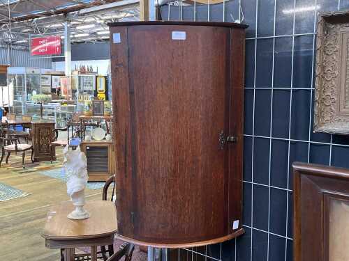 Georgian oak bow front corner cupboard