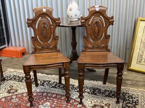 Pair of Victorian oak hall chairs