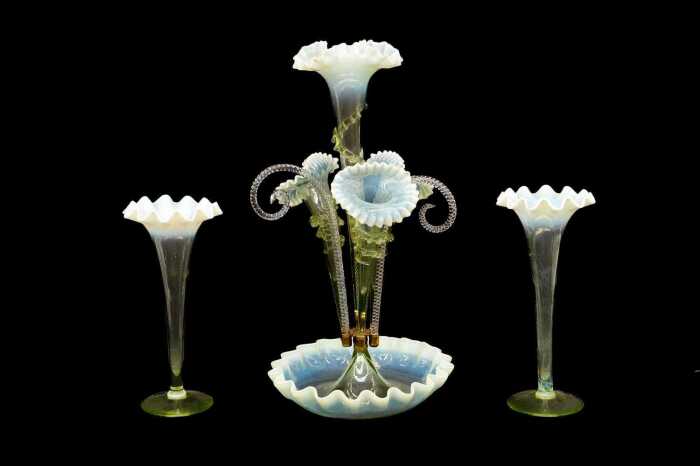 Victorian four trumpet uranium glass epergne with matching pair of vases