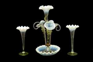Victorian four trumpet uranium glass epergne with matching pair of vases