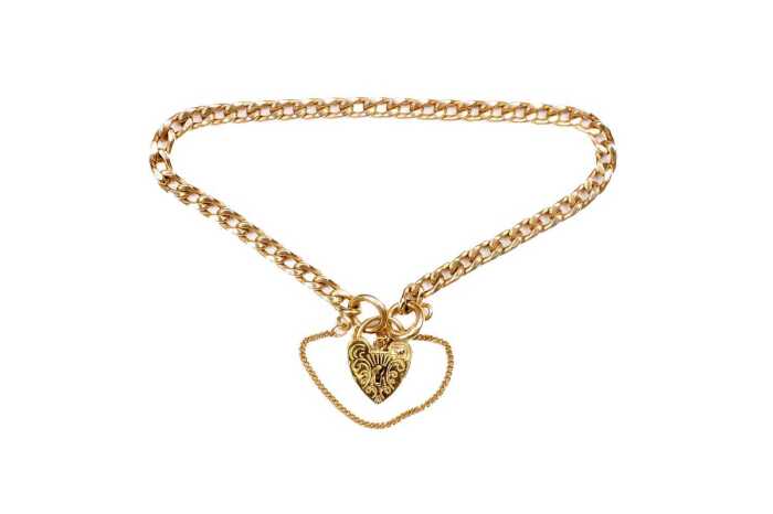 A curb link padlock bracelet in 9 carat yellow gold