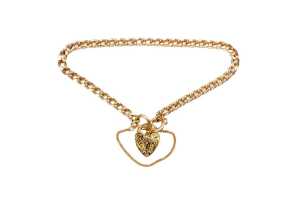 A curb link padlock bracelet in 9 carat yellow gold