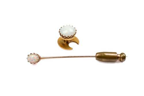 An antique opal tie pin and stick pin in 15 and 9 carat yellow gold