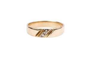 A diamond band in 9 carat yellow gold
