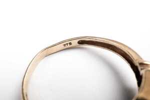 A garnet ring in 9 carat yellow gold - 5