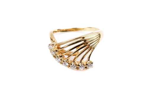 A diamond ring in 18 carat yellow gold