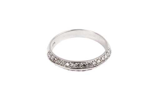 A diamond band in 18 carat white gold