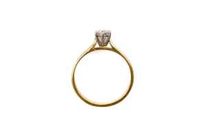 A diamond solitaire ring in 18ct yellow and white gold - 4