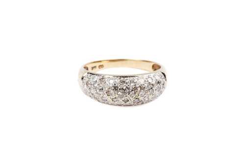 A diamond ring in 9 carat yellow gold