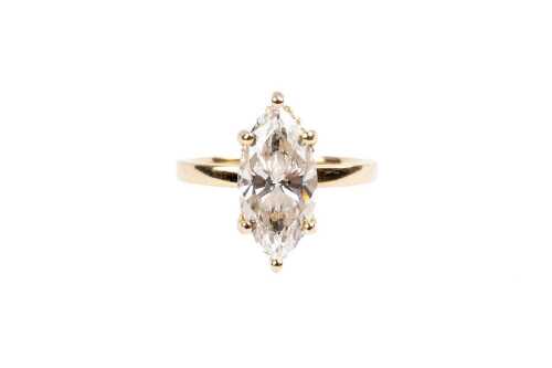 A laboratory grown diamond ring in 18 carat yellow gold